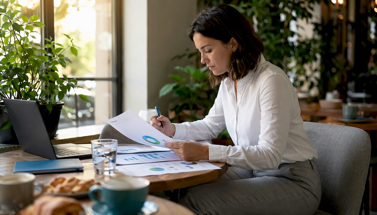 Energy analyst reviewing renewable energy reports