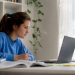 Student engaged in IB ESS online tutoring
