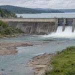 Dam altering downstream freshwater river flow